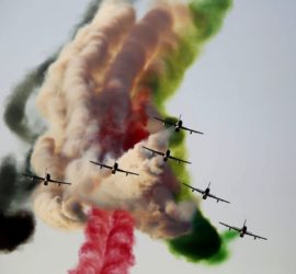 The Al Fursan aerobatic team of the United Arab Emirates' air force performs a stunt at the World Air Games in Dubai, United Arab Emirates, on Sunday, Dec. 6, 2015. The World Air Games includes precision aerobatics, skydiving and hot air balloon competitions. (AP Photo/Jon Gambrell) ORG XMIT: WPJG108